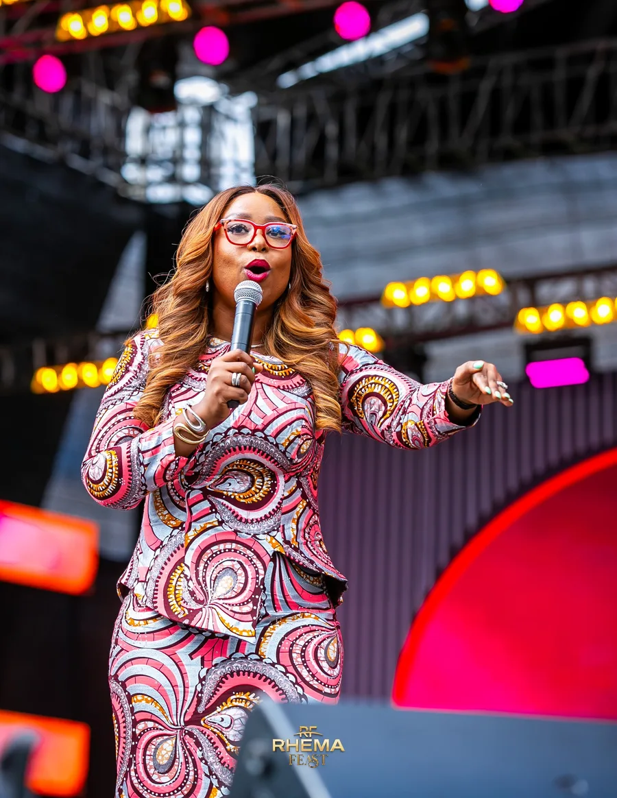Apostle Isi Igenegba mid-sentence on the Rhema Feast stage