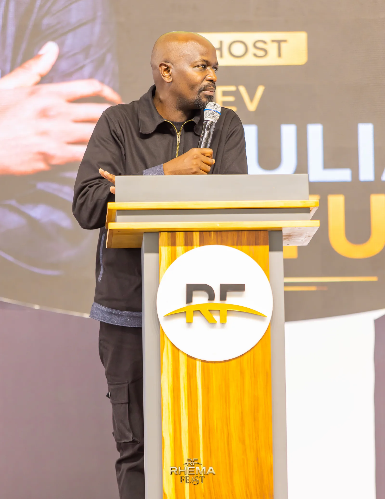 Rev Julian Kyula delivering the Tech Talk keynote