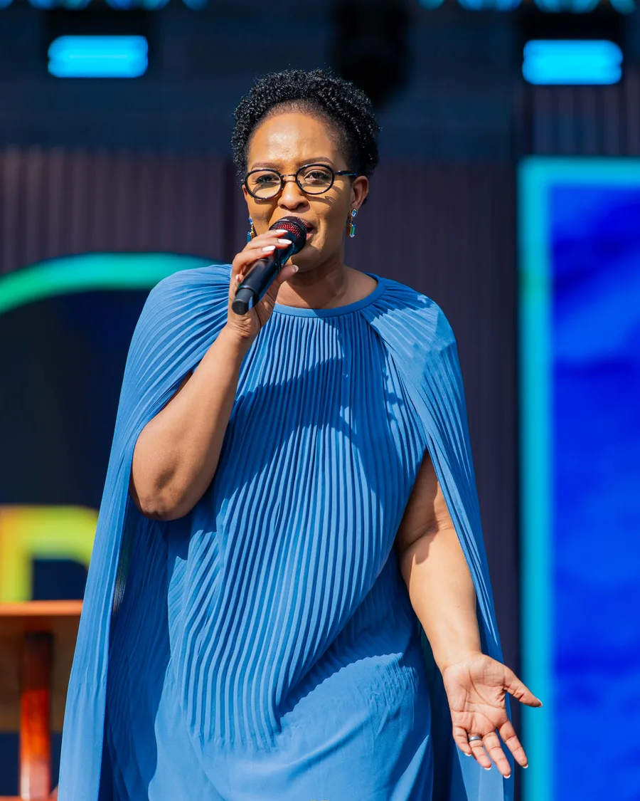 Apostle Mignonne Kabera, close on the microphone