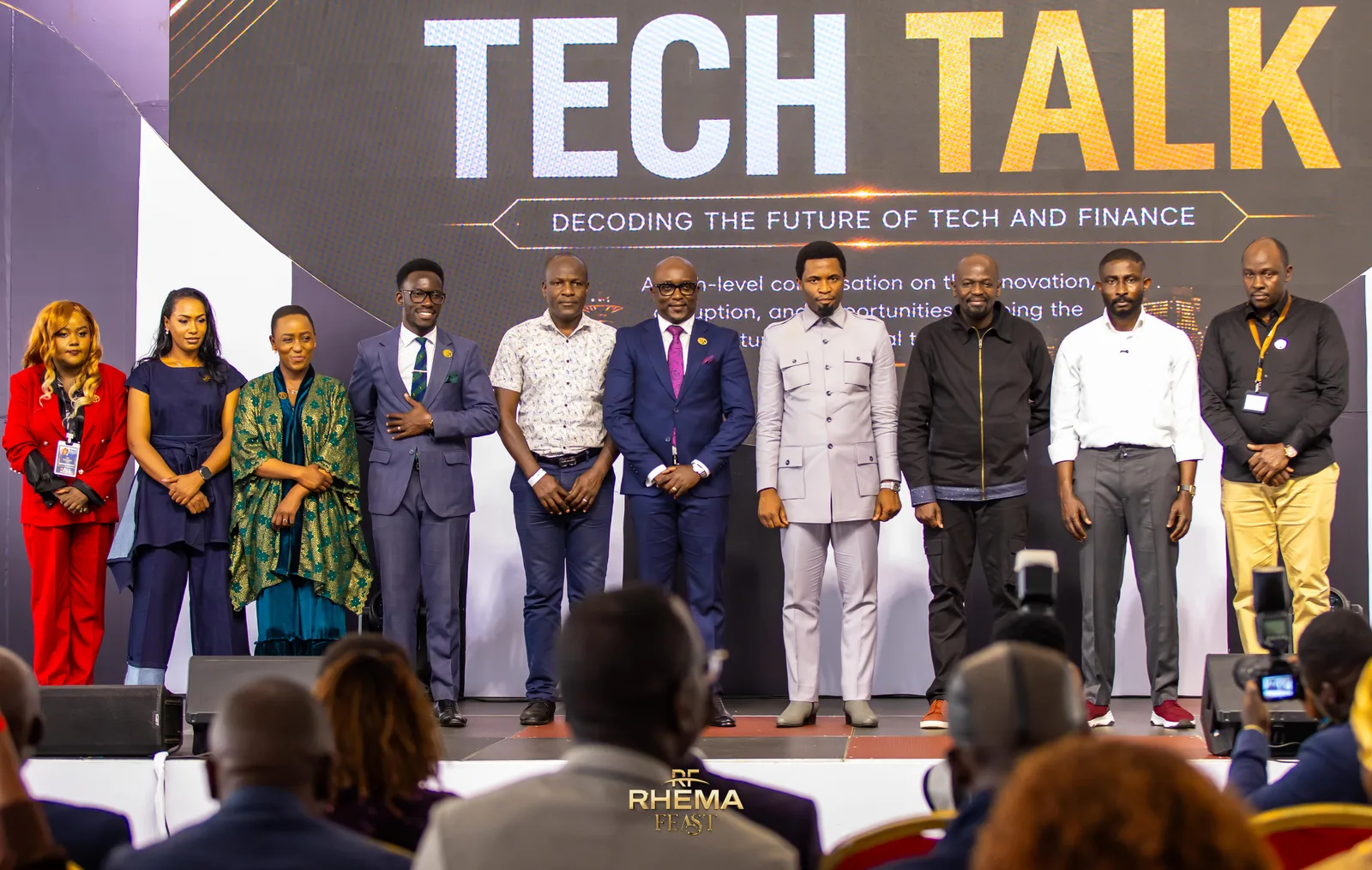 The Tech Talk speakers and hosts together on stage at the close