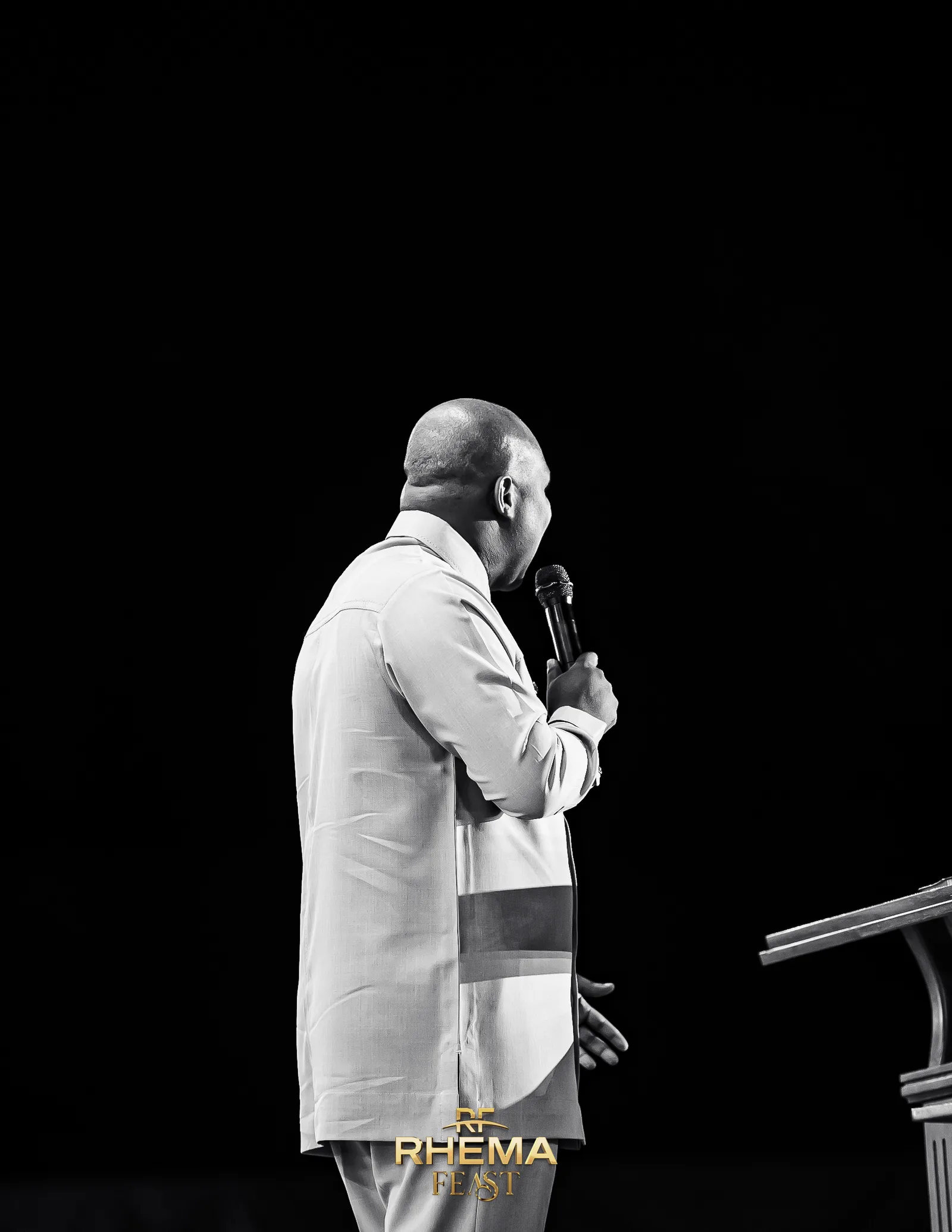 Apostle Joshua Selman in profile, in black and white, on the closing night
